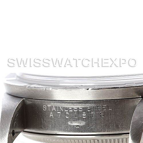 This image shows a close-up of the side of a Rolex Air-King 14010 Men's Stainless Steel Black Dial 14010 Men's Stainless Steel Black Dial watch, highlighting the stainless steel case and serial number.