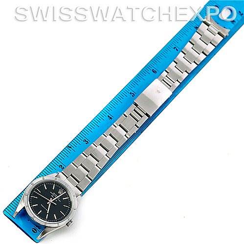 The image shows a Rolex Air-King 14010 Men's Stainless Steel Black Dial 14010 Men's Stainless Steel Black Dial watch at a top-down angle, fully extended alongside a ruler.