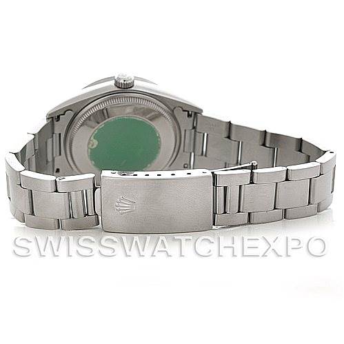 The image shows the back view of a Rolex Air-King 14010 Men's Stainless Steel White Dial 14010 Men's Stainless Steel White Dial watch, highlighting its stainless steel bracelet and clasp.