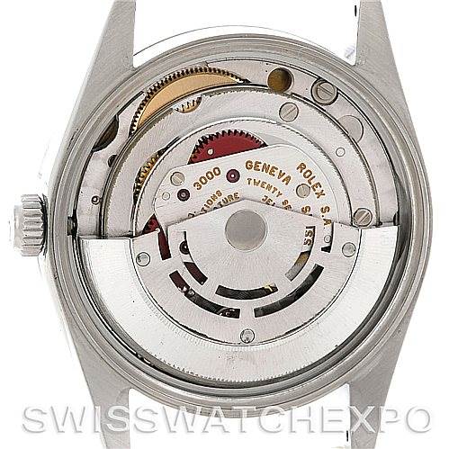 The image shows the back view of a Rolex Air-King 14010 Men's Stainless Steel White Dial 14010 Men's Stainless Steel White Dial watch, revealing its internal mechanical movement.