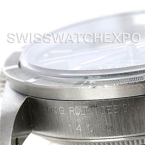 The image shows a close-up of the side of a Rolex Air-King 14010 Men's Stainless Steel Blue Dial 14010 Men's Stainless Steel Blue Dial watch, focusing on the engraved text "ORIG. ROLEX DESIGN 14010" and part of the bezel and case.