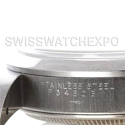 This image shows a side angle of a Rolex Air-King 14000 Men's Stainless Steel Blue Dial 14000 Men's Stainless Steel Blue Dial watch case, highlighting the stainless steel material and the serial number.