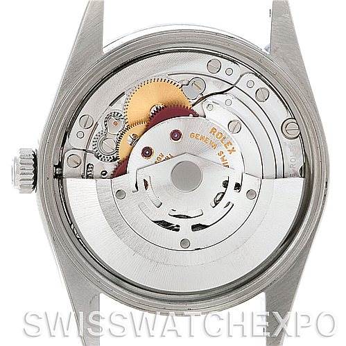 The image shows the back view of a Rolex Air-King 14000 Men's Stainless Steel Blue Dial 14000 Men's Stainless Steel Blue Dial watch, revealing its internal mechanical movement and gears.