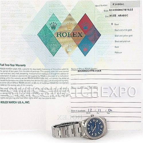 The image shows a Rolex Air-King 14000 Men's Stainless Steel Blue Dial 14000 Men's Stainless Steel Blue Dial watch with a blue dial, alongside its warranty card and documentation.