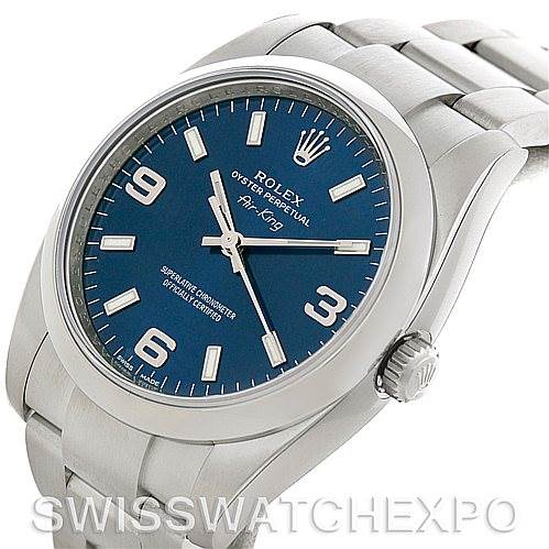 The image shows a Rolex Air-King 114200 Men's Stainless Steel Blue Dial 114200 Men's Stainless Steel Blue Dial watch at a 3/4 angle, featuring the dial, bezel, crown, and part of the bracelet.