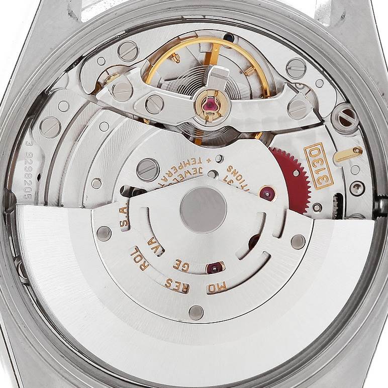 This image shows a close-up of the movement mechanism of a Rolex Air-King 14010 Men's Stainless Steel Blue Dial 14010 Men's Stainless Steel Blue Dial watch.