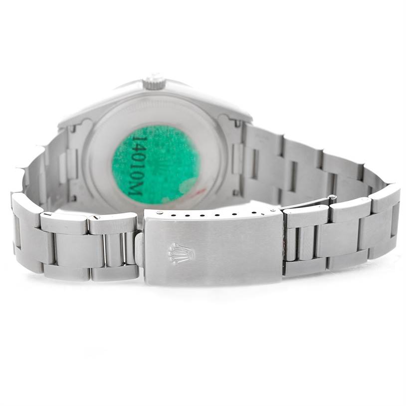 The image shows the backside of a Rolex Air-King 14010 Men's Stainless Steel Blue Dial 14010 Men's Stainless Steel Blue Dial watch, highlighting the bracelet clasp and case back.