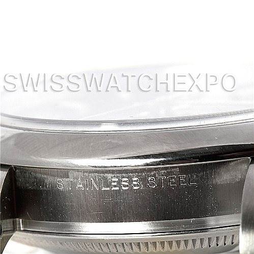 The image shows a close-up, side view of the stainless steel case of a Rolex Air-King 114200 Men's Stainless Steel Blue Dial 114200 Men's Stainless Steel Blue Dial watch.