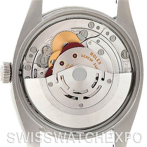 The image shows the back view of a Rolex Air-King 114200 Men's Stainless Steel Blue Dial 114200 Men's Stainless Steel Blue Dial watch, displaying its mechanical movement and internal components.