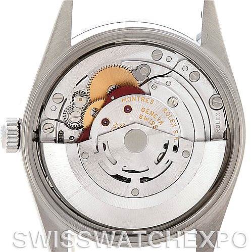 The image shows the movement and intricate internal components of a Rolex Air-King 14010 Men's Stainless Steel Silver Dial 14010 Men's Stainless Steel Silver Dial watch from the backside.