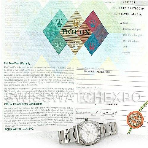 The image displays a Rolex Air-King 114210 Men's Stainless Steel Silver Dial 114210 Men's Stainless Steel Silver Dial watch at a slight angle, showing the bracelet and dial, alongside warranty and certification documents.