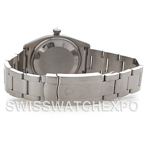 The image shows the back view of a Rolex Air-King 114210 Men's Stainless Steel Silver Dial 114210 Men's Stainless Steel Silver Dial watch, highlighting its stainless steel bracelet and clasp.