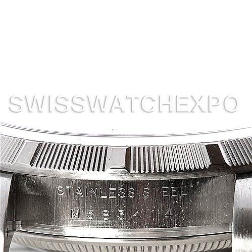 The image shows the side of a Rolex Air-King 114210 Men's Stainless Steel Silver Dial 114210 Men's Stainless Steel Silver Dial watch, highlighting the stainless steel case and model number engraving.