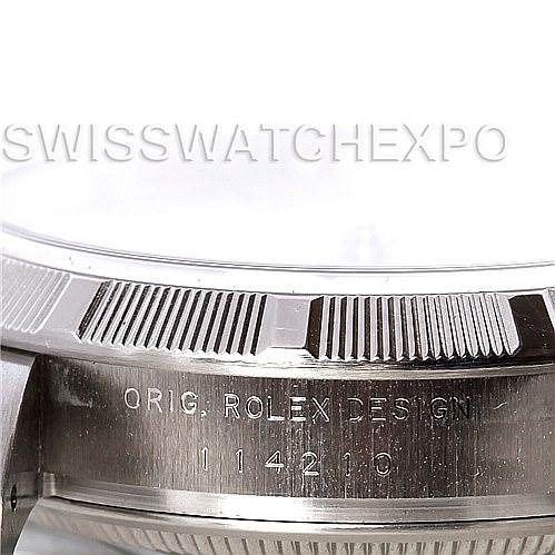 The image shows a close-up side view of the bezel and engraved case of a Rolex Air-King 114210 Men's Stainless Steel Silver Dial 114210 Men's Stainless Steel Silver Dial watch.