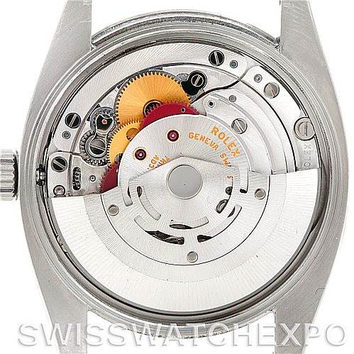 The image shows a close-up of the movement mechanism of the Rolex Air-King 114200 Men's Stainless Steel White Dial 114200 Men's Stainless Steel White Dial watch.