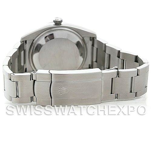 The image displays the back view of a Rolex Air-King 114200 Men's Stainless Steel Silver Dial 114200 Men's Stainless Steel Silver Dial watch, showcasing its stainless steel case and bracelet.