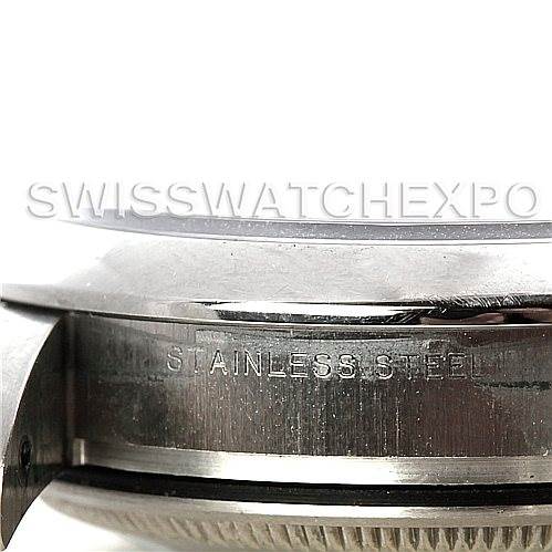 This close-up image of the Rolex Air-King 114200 Men's Stainless Steel Silver Dial 114200 Men's Stainless Steel Silver Dial watch shows the side of the case, highlighting the stainless steel material.