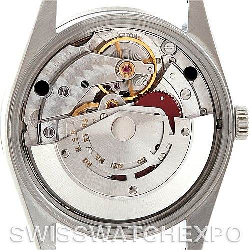 This is a close-up view of the internal mechanical movement of the Rolex Air-King 14010 Men's Stainless Steel Black Dial 14010 Men's Stainless Steel Black Dial watch, showing gears and components.