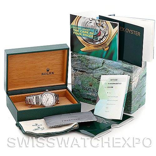 The image shows a Rolex Air-King 14010 Men's Stainless Steel Silver Dial 14010 Men's Stainless Steel Silver Dial watch at a straight-on angle, inside its box with accompanying booklets and accessories.