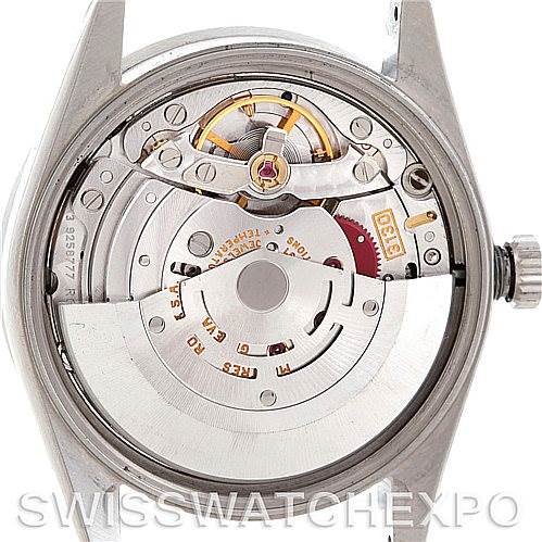 This image shows the internal mechanism of a Rolex Air-King 14010 Men's Stainless Steel Silver Dial 14010 Men's Stainless Steel Silver Dial watch from a rear, open case angle.