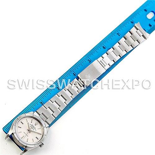 The image shows a Rolex Air-King 14010 Men's Stainless Steel Silver Dial 14010 Men's Stainless Steel Silver Dial watch laid flat next to a blue ruler, displaying the full length of the watch and its metal bracelet.