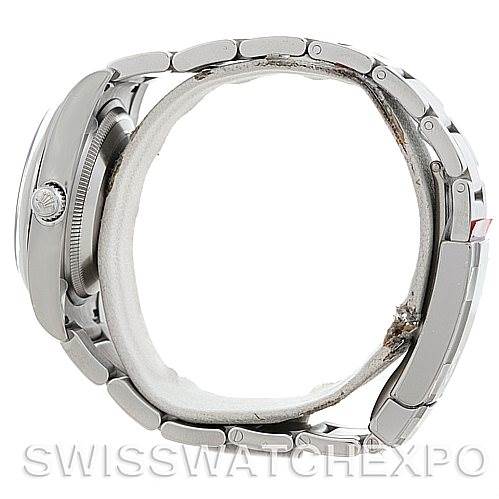 This side view image of the Rolex Air-King 114200 Men's Stainless Steel Blue Dial 114200 Men's Stainless Steel Blue Dial showcases the watch's case, crown, and metallic bracelet.