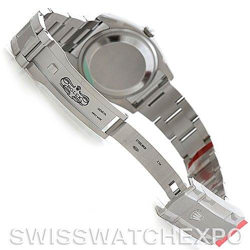 The image shows the back and inner clasp of the Rolex Air-King 114200 Men's Stainless Steel Blue Dial 114200 Men's Stainless Steel Blue Dial watch at an angle.