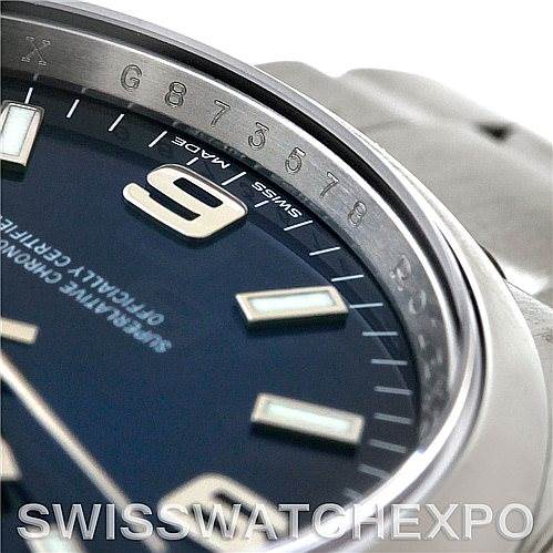 This image shows a close-up angle of the dial and bezel of a Rolex Air-King 114200 Men's Stainless Steel Blue Dial 114200 Men's Stainless Steel Blue Dial watch.
