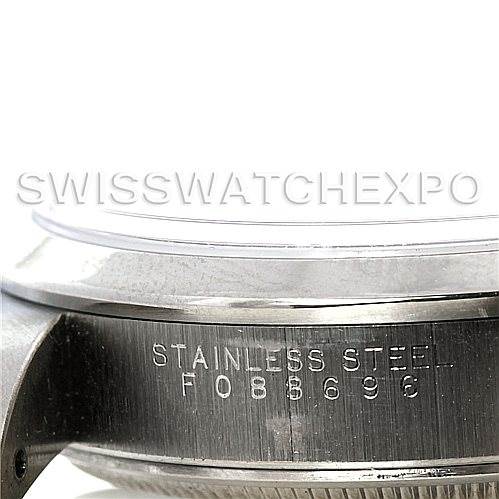 This image shows a close-up side view of the casing and partially visible bezel of a Rolex Air-King 14000 Men's Stainless Steel Blue Dial 14000 Men's Stainless Steel Blue Dial watch, with its serial number engraved.