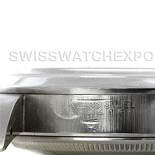 This is a close-up view of the side of a Rolex Air-King 14000 Men's Stainless Steel White Dial 14000 Men's Stainless Steel White Dial watch, showing the stainless steel casing and serial number engraving.