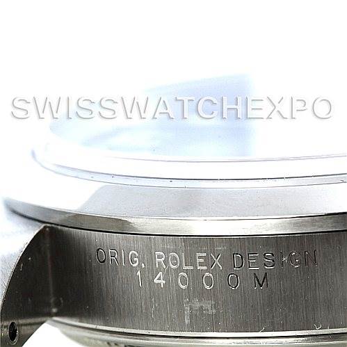 This image shows a close-up of the side of a Rolex Air-King 14000 Men's Stainless Steel Blue Dial 14000 Men's Stainless Steel Blue Dial watch case, featuring the engraving "ORIG. ROLEX DESIGN 14000M."