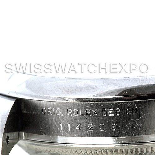 The image shows a close-up of the side of the Rolex Air-King 114200 Men's Stainless Steel White Dial 114200 Men's Stainless Steel White Dial watch case, highlighting the engraving with the text "ORIG. ROLEX DESIGN 114200."
