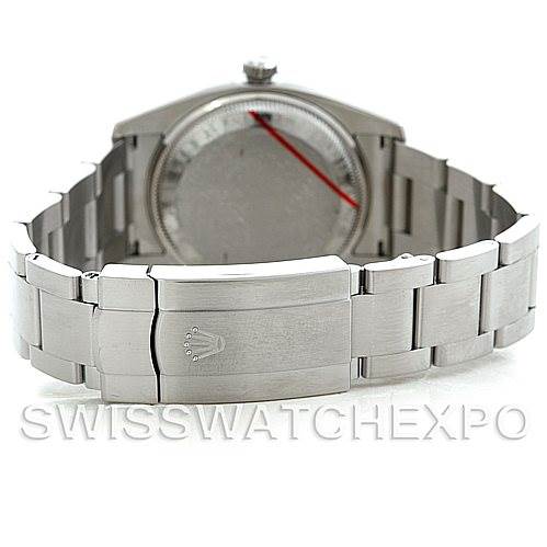 The image shows the back view of a Rolex Air-King 114200 Men's Stainless Steel White Dial 114200 Men's Stainless Steel White Dial watch, highlighting its clasp, bracelet, and case back.