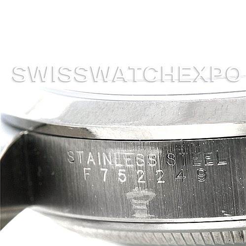 The image shows a close-up of the side of a Rolex Air-King 14000 Men's Stainless Steel Blue Dial 14000 Men's Stainless Steel Blue Dial watch, focusing on the serial number and "Stainless Steel" engraving.