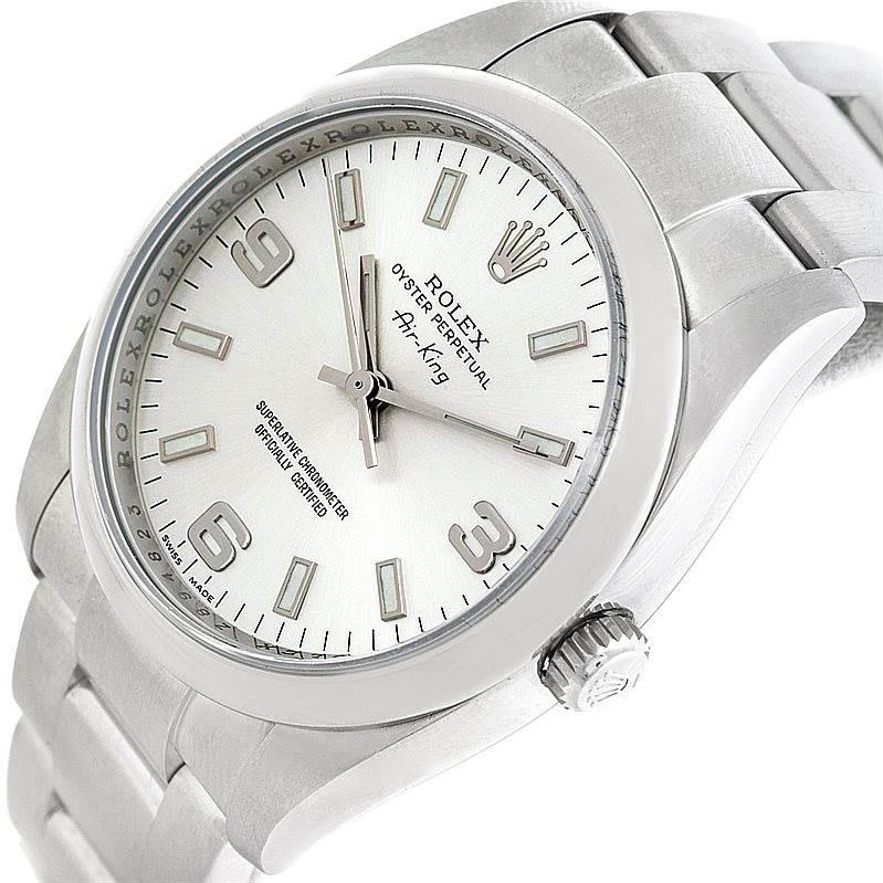 The image shows a close-up, angled view of the Rolex Air-King 114200 Men's Stainless Steel Silver Dial 114200 Men's Stainless Steel Silver Dial watch, highlighting the dial, crown, and a portion of the bracelet.