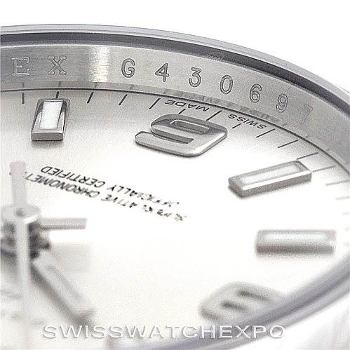 The image shows a close-up of the dial and rehaut of a Rolex Air-King 114200 Men's Stainless Steel Silver Dial 114200 Men's Stainless Steel Silver Dial watch with visible indices and part of the model number.