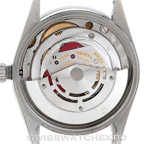 This image shows the back view of a Rolex Air-King 14010 Men's Stainless Steel White Dial 14010 Men's Stainless Steel White Dial watch case, revealing its internal mechanical movement.
