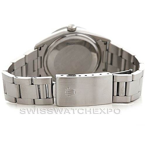 This image shows the back of the Rolex Air-King 14010 Men's Stainless Steel White Dial 14010 Men's Stainless Steel White Dial watch, focusing on the case back and the closed clasp of the bracelet.