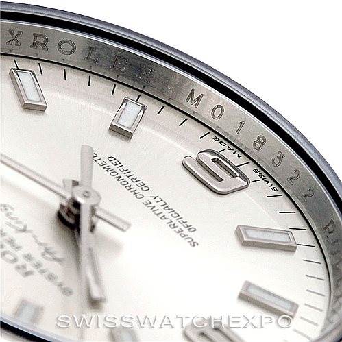 This close-up image shows the dial, part of the bezel, and markers of the Rolex Air-King 114210 Men's Stainless Steel Silver Dial 114210 Men's Stainless Steel Silver Dial watch.
