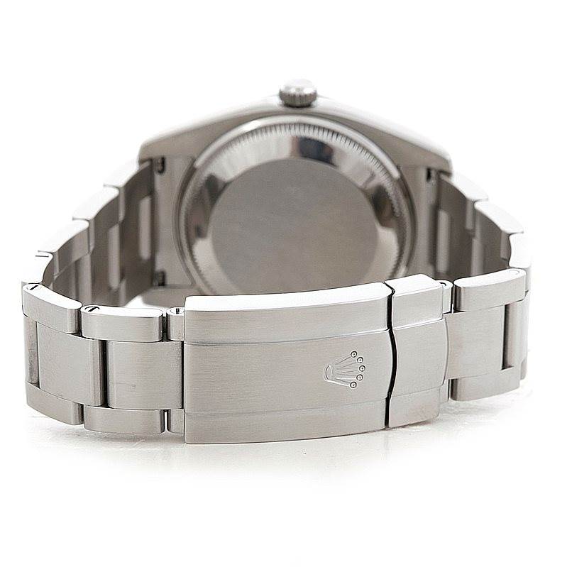 The image shows the back and clasp of a Rolex Air-King 114200 Men's Stainless Steel White Dial 114200 Men's Stainless Steel White Dial watch at a slight angle.