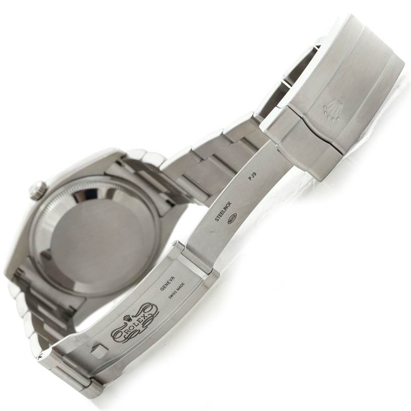 The image shows the back case and opened stainless steel bracelet of the Rolex Air-King 114200 Men's Stainless Steel Silver Dial 114200 Men's Stainless Steel Silver Dial watch.