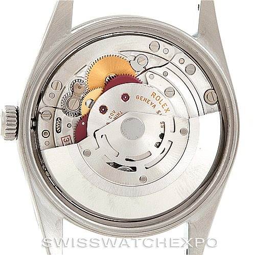 The image shows the back view of a Rolex Air-King 14000 Men's Stainless Steel Black Dial 14000 Men's Stainless Steel Black Dial watch, revealing its intricate internal movement and mechanism.