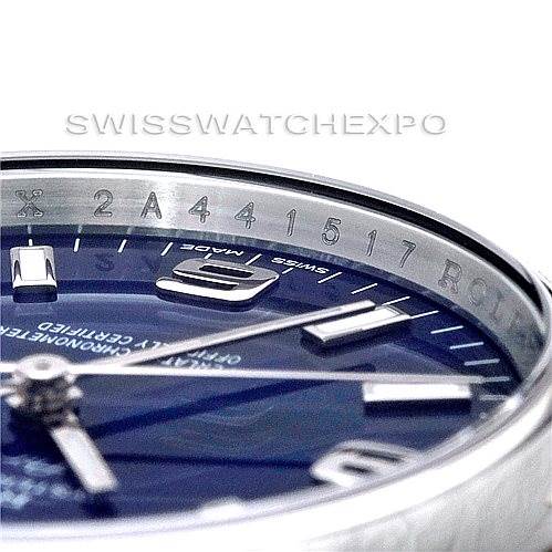 This image shows a close-up of the dial and inner bezel (rehaut) of a Rolex Air-King 114200 Men's Stainless Steel Blue Dial 114200 Men's Stainless Steel Blue Dial watch.