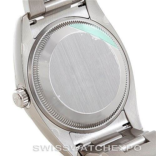 This image shows the back case and bracelet of a Rolex Air-King 114200 Men's Stainless Steel Blue Dial 114200 Men's Stainless Steel Blue Dial watch, including the screw-down case back and part of the crown.