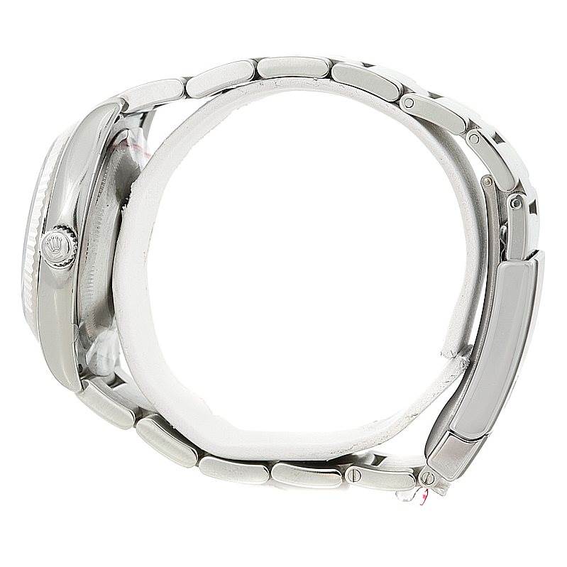 This image shows a Rolex Air-King 114234 Men's Stainless Steel White Dial 114234 Men's Stainless Steel White Dial watch from a side view, displaying its case, crown, and metal bracelet.