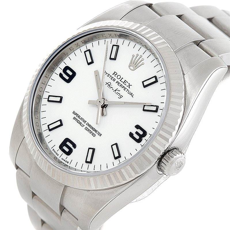 This image shows a close-up view of a Rolex Air-King 114234 Men's Stainless Steel White Dial 114234 Men's Stainless Steel White Dial watch, highlighting the dial, hands, bezel, and part of the bracelet.