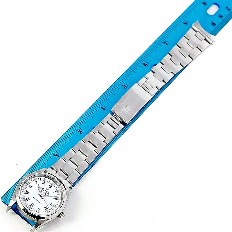 The image shows the Rolex Air-King 14000 Men's Stainless Steel White Dial 14000 Men's Stainless Steel White Dial watch laid flat with a blue ruler, displaying the dial, bracelet, and clasp from a top-down angle.