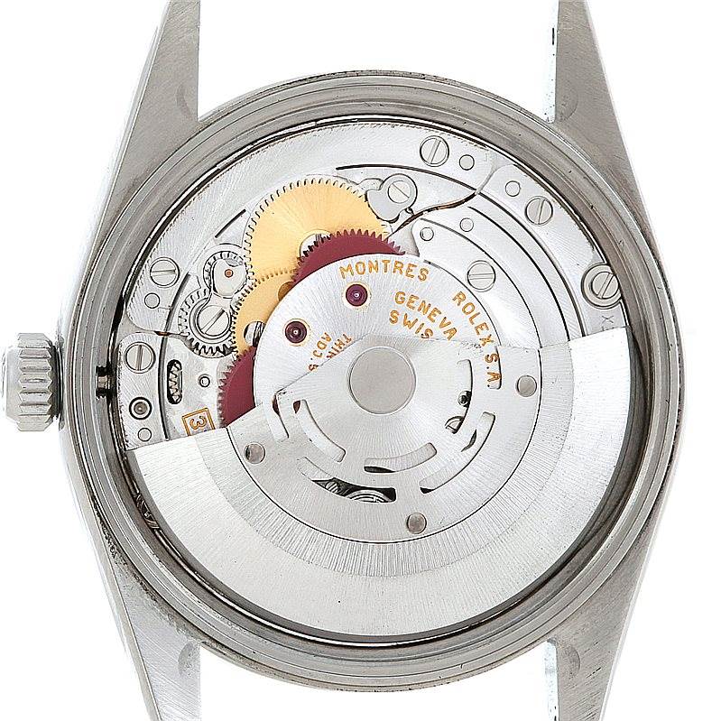 The image showcases the inner mechanical components and movement of the Rolex Air-King 14000 Men's Stainless Steel White Dial 14000 Men's Stainless Steel White Dial watch from a rear view.
