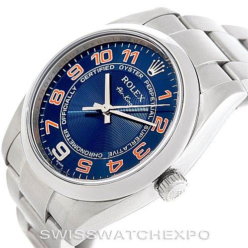 The Rolex Air-King 114200 Men's Stainless Steel Blue Dial 114200 Men's Stainless Steel Blue Dial watch is displayed at a slight angle, showing its blue dial, crown, and stainless steel bracelet.