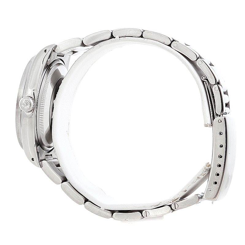 The image shows a side view of the Rolex Air-King 14010 Men's Stainless Steel Blue Dial 14010 Men's Stainless Steel Blue Dial watch, highlighting its case, crown, and metal bracelet with adjustable clasp.